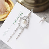 Asymmetric petal Pearl Earrings